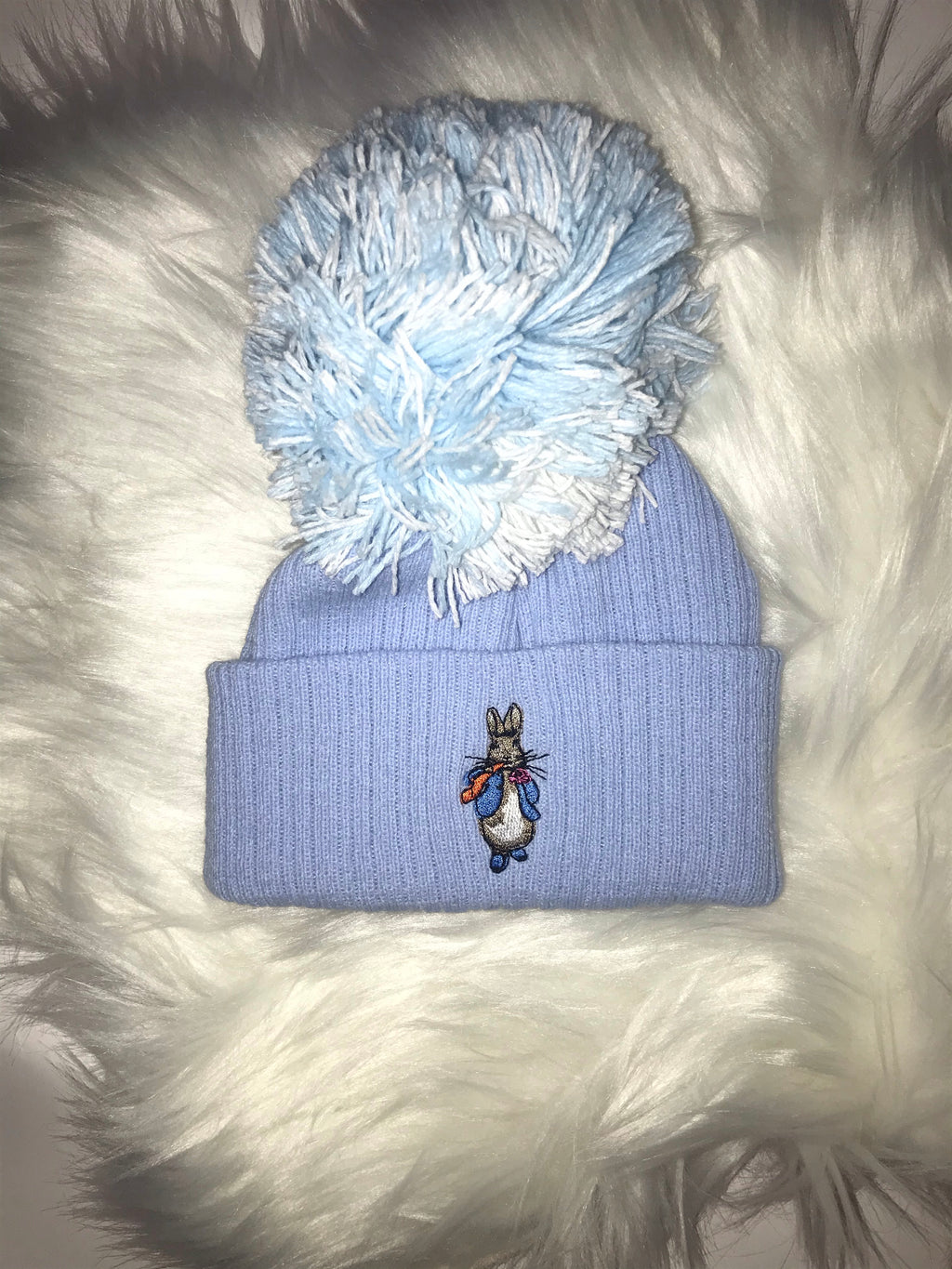 Peter rabbit embroidered Pom hat in Blue
